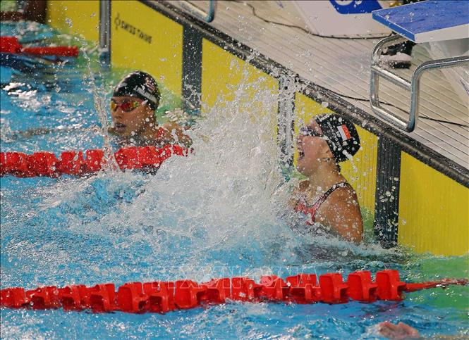 Niềm vui của VĐV Singapore Jing Wen Quah xuất sắc đạt HCV và phá kỷ lục SEA Games nội dung 200m bơi bướm nữ với thành tích 2 phút 09 giây 52. Ảnh: Phạm Kiên - TTXVN