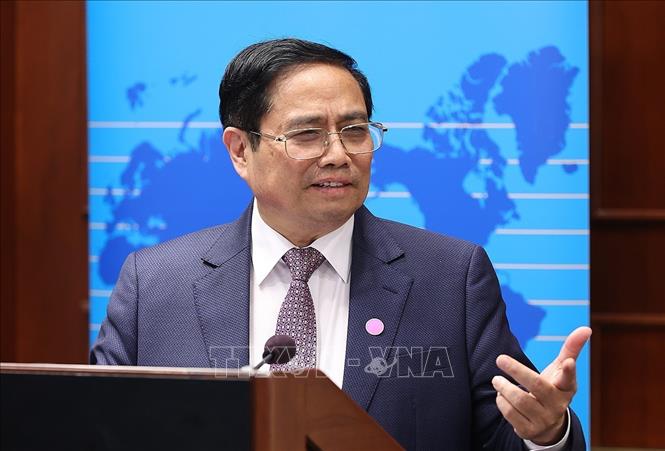 Thủ tướng Phạm Minh Chính phát biểu tại buổi Tọa đàm. Ảnh: Dương Giang-TTXVN