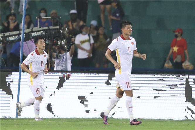 Nguyen Van Tung (11) opens the score for Vietnam. VNA Photo