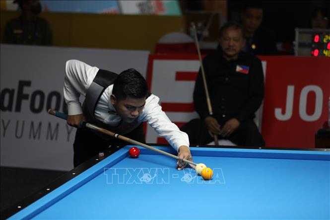VĐV Nguyễn Trần Thanh Tự (Việt Nam) thi đấu bán kết nội dung Cushion Carom. Ảnh: Khánh Hoà-TTXVN