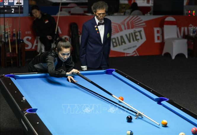 VĐV Trần Thị Ngọc Huyền (Việt Nam) thi đấu nội dung 10-Ball Pool nữ. Ảnh: Khánh Hoà - TTXVN 