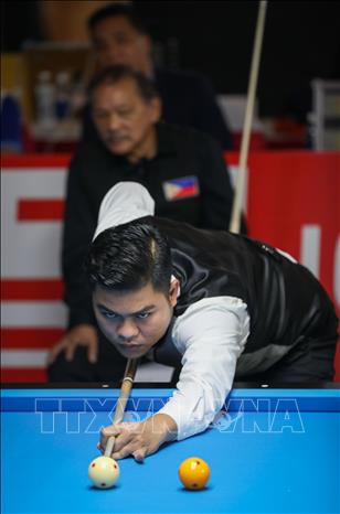 VĐV Nguyễn Trần Thanh Tự (Việt Nam) thi đấu bán kết nội dung Cushion Carom. Ảnh: Khánh Hoà-TTXVN