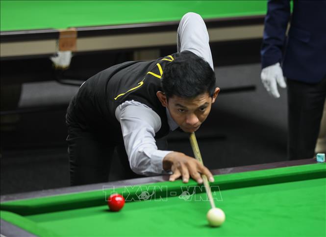 VĐV Chhay Suon (Campuchia) thi đấu nội dung snooker. Ảnh: Khánh Hoà - TTXVN