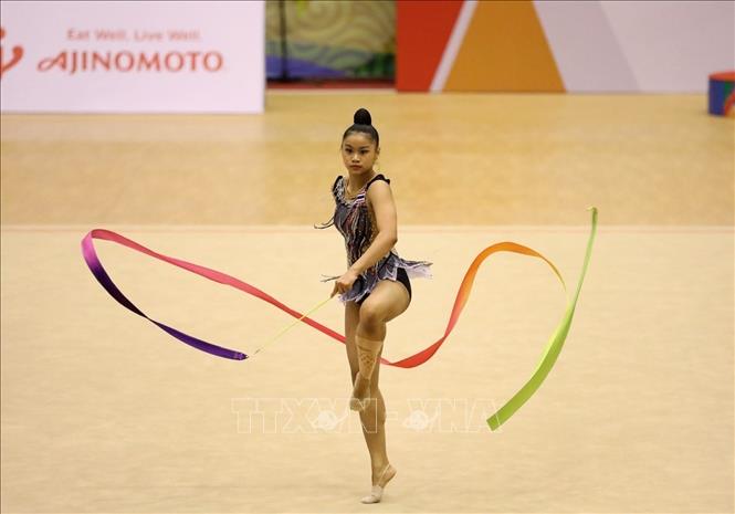 Gymnast Peeramatukorn Piyada (Thailand) competes in the ribbon event of artistic gymnastics. VNA Photo 