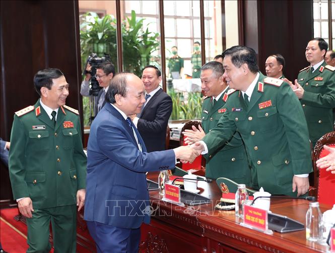 Chủ tịch nước Nguyễn Xuân Phúc với các đại biểu dự buổi lễ. Ảnh: Trọng Đức - TTXVN