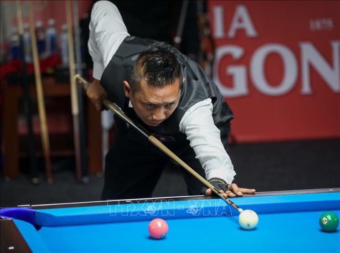 VĐV Vongxay Hongsavady (Lào) thi đấu nội dung 10 Ball Pool. Ảnh: Khánh Hoà - TTXVN