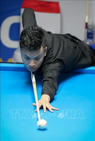VĐV Đỗ Thế Kiên (Việt Nam) thi đấu nội dung 10 Ball Pool. Ảnh: Khánh Hoà - TTXVN