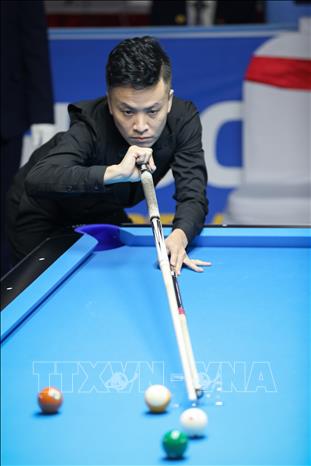 VĐV Đỗ Thế Kiên (Việt Nam) thi đấu nội dung 10 Ball Pool. Ảnh: Khánh Hoà - TTXVN
