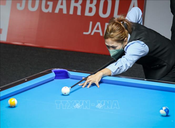 VĐV Suhana Dewi Sabbu (Malaysia) thi đấu nội dung 10 Ball Pool nữ. Ảnh: Khánh Hoà - TTXVN