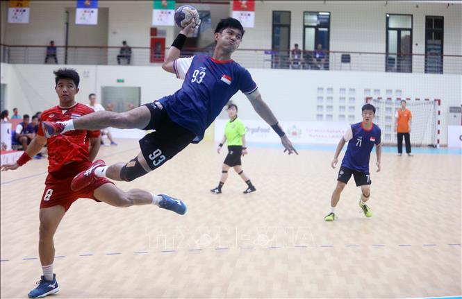 Tan Zhi Jie Darius (93) of Singapore scores a goal. VNA Photo: Thế Duyệt
