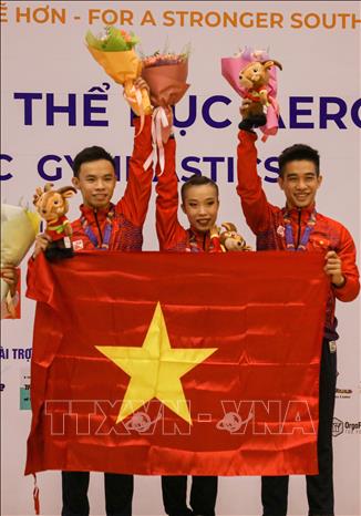 Đội Aerobic Việt Nam giành HCV nội dung nhóm bài 3 người môn Aerobic. Ảnh: Khánh Hoà - TTXVN