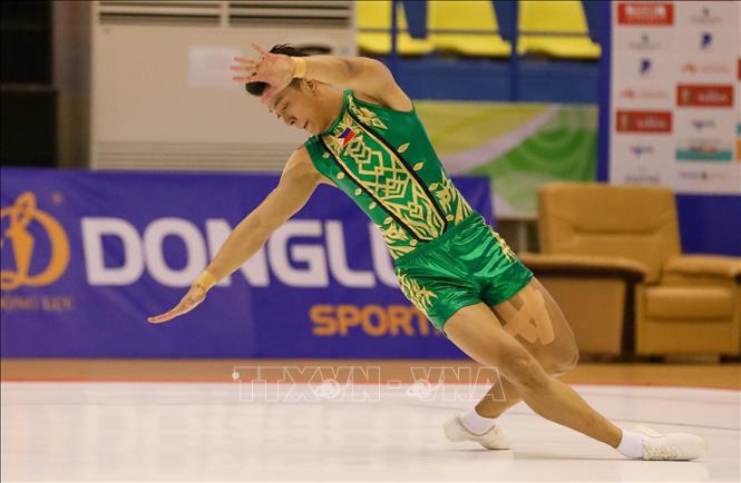 VĐV Tangonan Carl Joshua P (Philippines) thi đấu nội dung đơn nam. Ảnh: Khánh Hoà - TTXVN