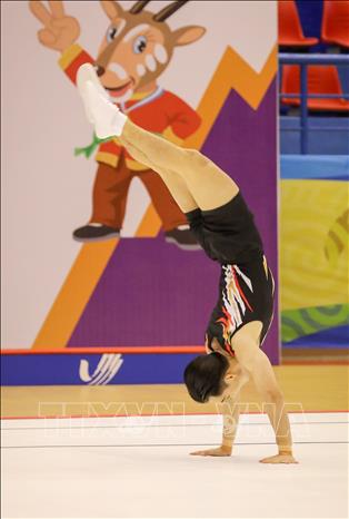 VĐV Chanokpon Jiumsukjai (Thái Lan) thi đấu nội dung đơn nam. Ảnh: Khánh Hoà - TTXVN