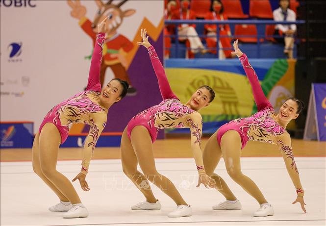 Đội Aerobic Thái Lan thi đấu nội dung nhóm bài 3 người. Ảnh: Khánh Hoà - TTXVN