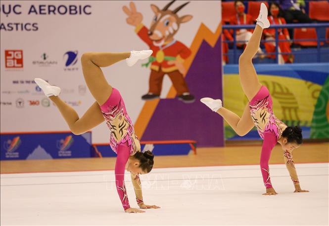 Đội Aerobic Thái Lan thi đấu nội dung nhóm bài 3 người. Ảnh: Khánh Hoà - TTXVN