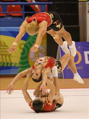 Đội Aerobic Philippines thi đấu nội dung nhóm bài 3 người. Ảnh: Khánh Hoà - TTXVN