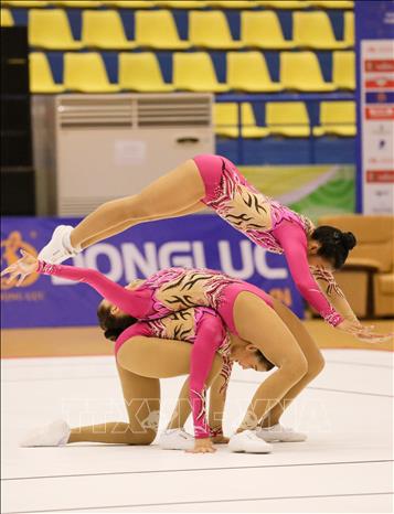 Đội Aerobic Thái Lan thi đấu nội dung nhóm bài 3 người. Ảnh: Khánh Hoà - TTXVN