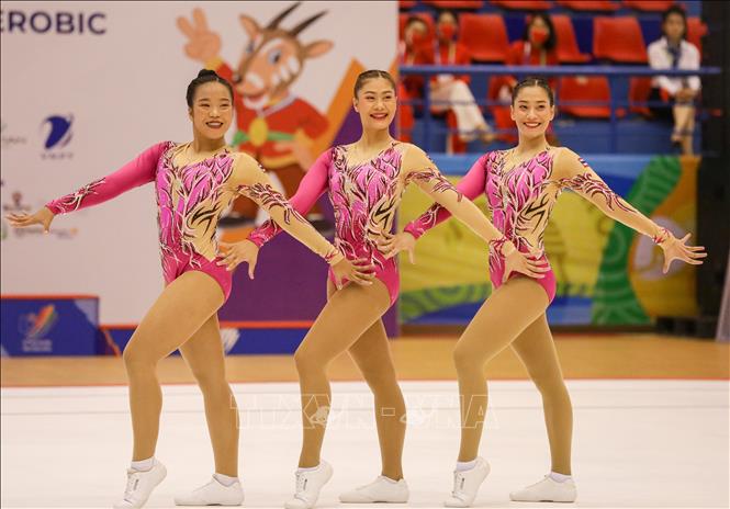 Đội Aerobic Thái Lan thi đấu nội dung nhóm bài 3 người. Ảnh: Khánh Hoà - TTXVN