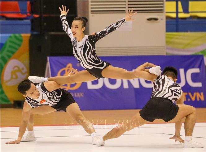 Đội Aerobic Việt Nam thi đấu nội dung nhóm bài 3 người. Ảnh: Khánh Hoà - TTXVN
