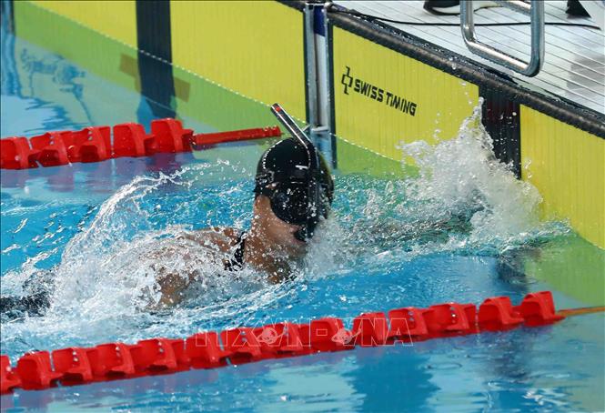 Nguyen Thanh Loc of Vietnam competes in the men's 100m surface event. VNA Photo: Phạm Kiên
