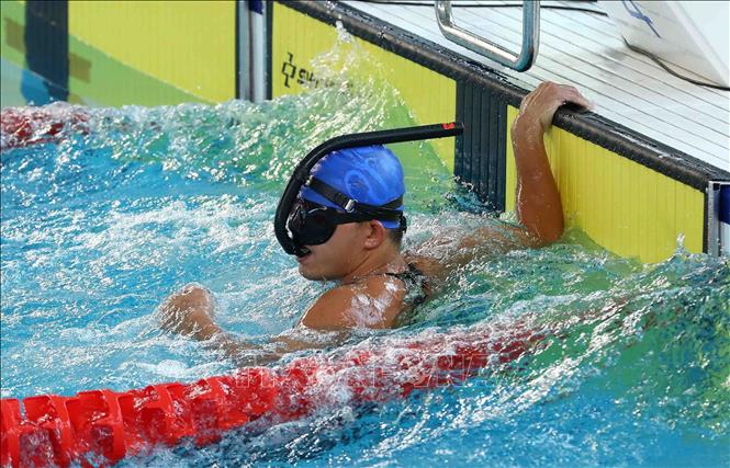 Do Dinh Toan of Vietnam competes in the men's 100m surface event. VNA Photo: Phạm Kiên