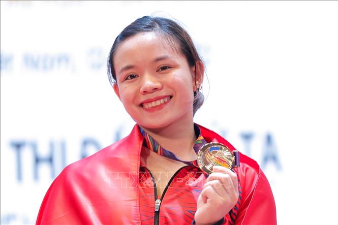 Vietnamese weightlifter Pham Thi Hong Thanh clinched the gold in the women’s 64kg category at SEA Games 31 on May 21. VNA Photo