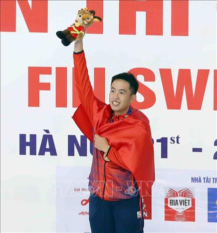 VĐV Nguyễn Thành Lộc (Việt Nam) giành HCV và phá kỷ lục SEA Games nội dung 100m lặn vòi hơi chân vịt nam với thành tích 34 giây 82. Ảnh: Phạm Kiên - TTXVN