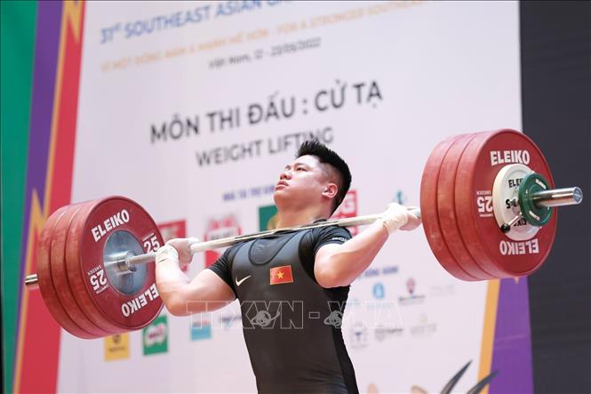 VĐV Bùi Tuấn Anh (Việt Nam) thi đấu hạng 89 kg nam và giành HCB. Ảnh: Việt Cường - TTXVN