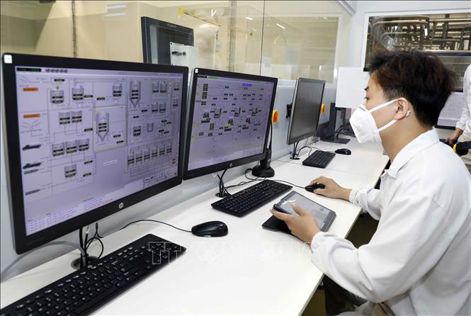 Trung tâm điều khiển hoạt động sản xuất tại nhà máy Nestleé Bông Sen. Ảnh : Trần Việt - TTXVN