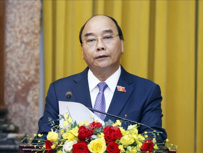 Chủ tịch nước Nguyễn Xuân Phúc, Thống lĩnh các lực lượng vũ trang nhân dân, Chủ tịch Hội đồng Quốc phòng và An ninh phát biểu giao nhiệm vụ. Ảnh: Thống Nhất – TTXVN

