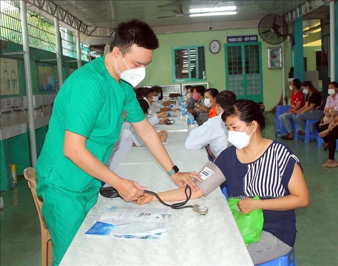 Trong ảnh: Công ty TNHH SBGEAR Vina phối hợp cùng Liên đoàn Lao động huyện Hóc Môn tổ chức Ngày hội “Sức khỏe cho người lao động”. Ảnh: Thanh Vũ - TTXVN