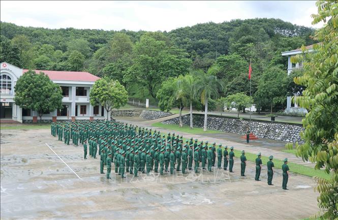 Trong ảnh: Lễ Chào cờ ở Tiểu đoàn Huấn luyện, cơ động (Bộ đội Biên phòng tỉnh Điện Biên). Ảnh: Xuân Tiến- TTXVN 