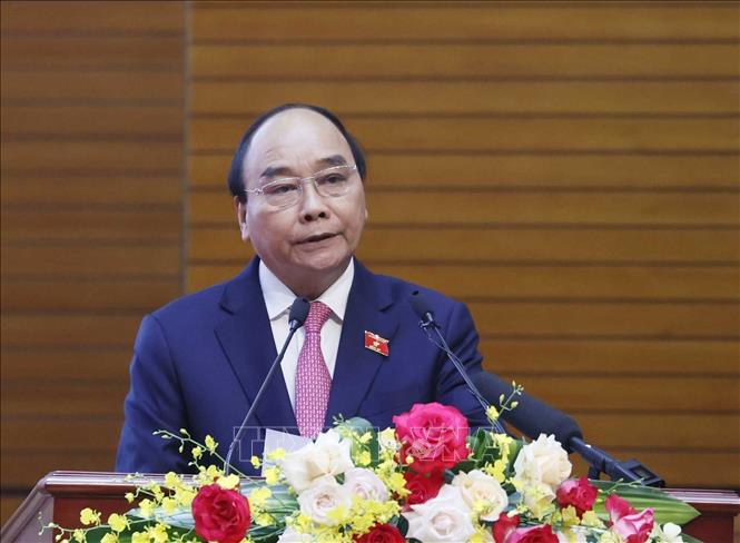 Chủ tịch nước Nguyễn Xuân Phúc phát biểu chúc mừng Binh đoàn 11. Ảnh: Thống Nhất – TTXVN