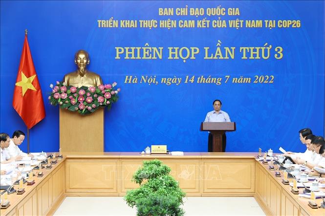 Prime Minister Pham Minh Chinh chairs the third meeting of the national steering committee for implementing commitments at the 26th UN Climate Change Conference of the Parties. VNA Photo: Dương Giang