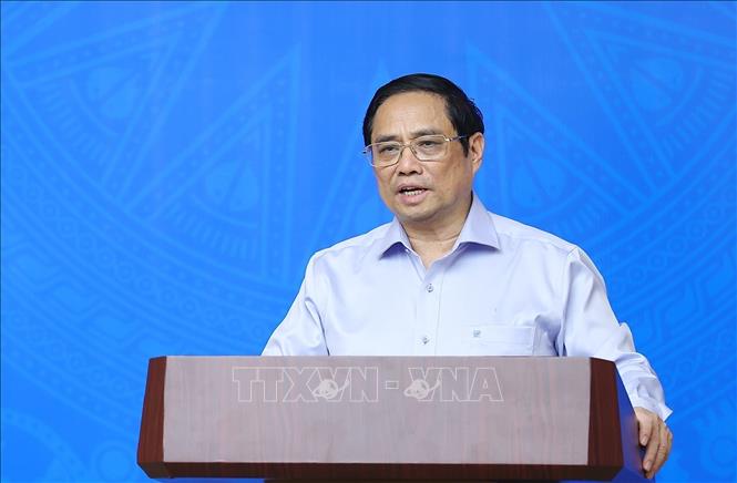 Prime Minister Pham Minh Chinh chairs the third meeting of the national steering committee for implementing commitments at the 26th UN Climate Change Conference of the Parties. VNA Photo: Dương Giang