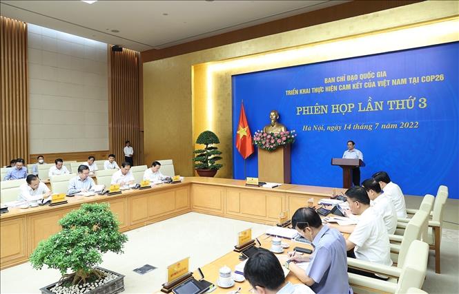 Prime Minister Pham Minh Chinh chairs the third meeting of the national steering committee for implementing commitments at the 26th UN Climate Change Conference of the Parties. VNA Photo: Dương Giang