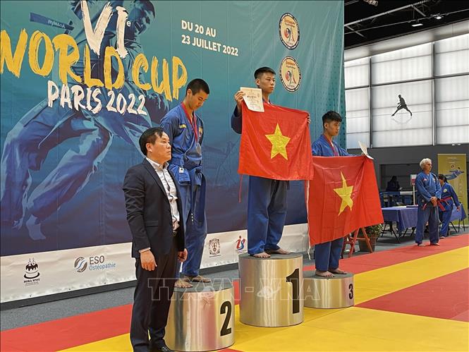 Lễ trao Huy chương Vàng và Đồng cho các võ sinh Việt Nam. Ảnh: Thu Hà - TTXVN