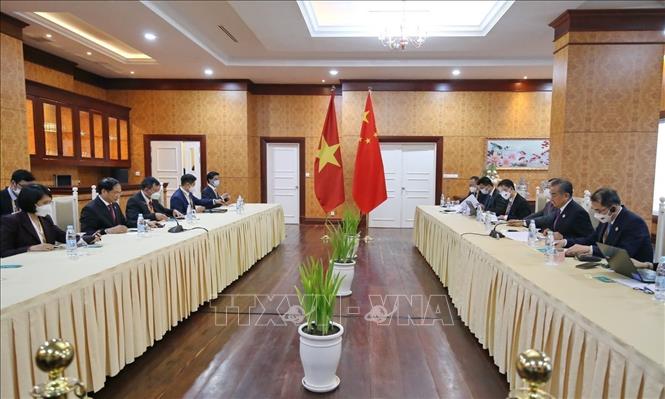 Foreign Minister Bui Thanh Son has a bilateral meeting with his Chinese counterpart Wang Yi on the sidelines of the meetings. VNA Photo