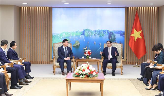 Thủ tướng Phạm Minh Chính tiếp ông Roh Tae-moon, Tổng Giám đốc Samsung Electronics (Hàn Quốc). Ảnh: Dương Giang-TTXVN