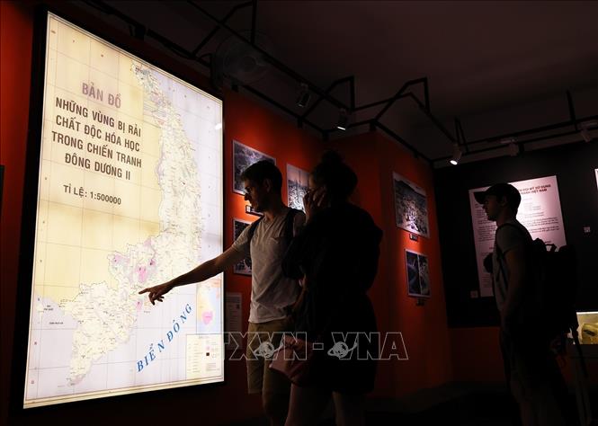 Visitors learn about the consequences of Agent Orange in Vietnam at the War Remnants Museum in Ho Chi Minh City. VNA Photo: Hồng Đạt