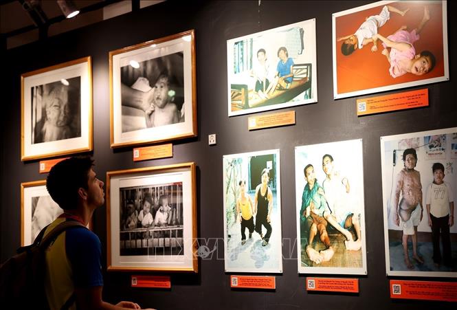 Visitors learn about the consequences of Agent Orange in Vietnam at the War Remnants Museum in Ho Chi Minh City. VNA Photo: Hồng Đạt