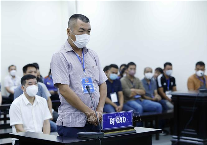 Trong ảnh: Bị cáo Lê Đình Trung khai báo trước tòa. Ảnh: An Đăng - TTXVN