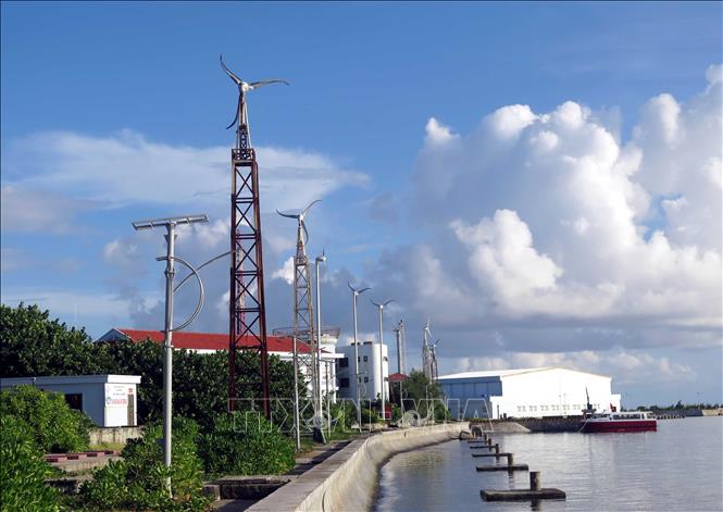 Wind turbines on Truong Sa island. VNA Photo: Quân Trang