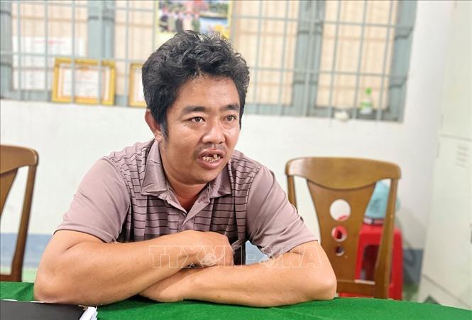Đối tượng Lê Văn Danh tại cơ quan điều tra. Ảnh: TTXVN phát