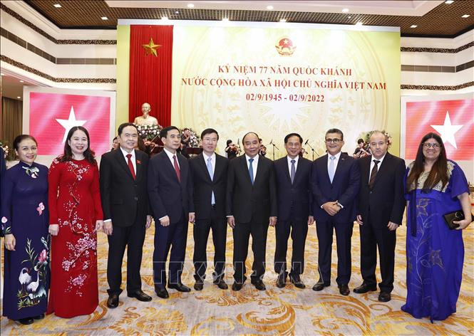 Chủ tịch nước Nguyễn Xuân Phúc với các đại biểu. Ảnh: Thống Nhất-TTXVN

