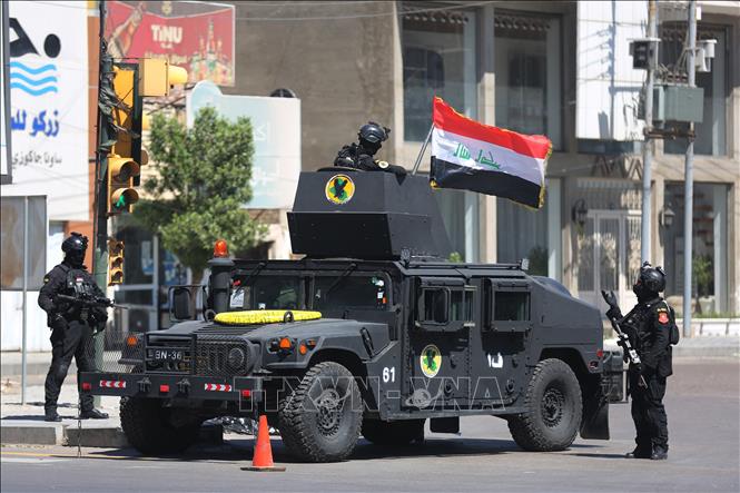 Trong ảnh: Cảnh sát chống khủng bố tăng cường an ninh tại thủ đô  Baghdad, Iraq. Ảnh: AFP/TTXVN
