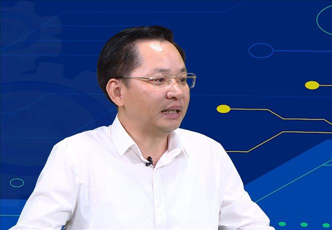 Trong ảnh: Ông Nguyễn Hữu Tú, Thành viên Hội đồng thành viên Tập đoàn Hóa chất Việt Nam tham luận tại tọa đàm. Ảnh: Trần Việt - TTXVN
