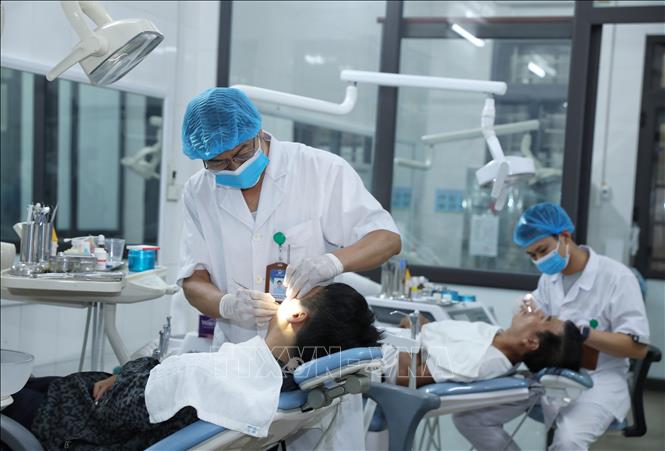 Trong ảnh: Khám chữa bệnh tại Chuyên Khoa Răng hàm mặt, Bệnh viện Đa khoa Sông Thương (Bắc Giang). Ảnh: Danh Lam-TTXVN