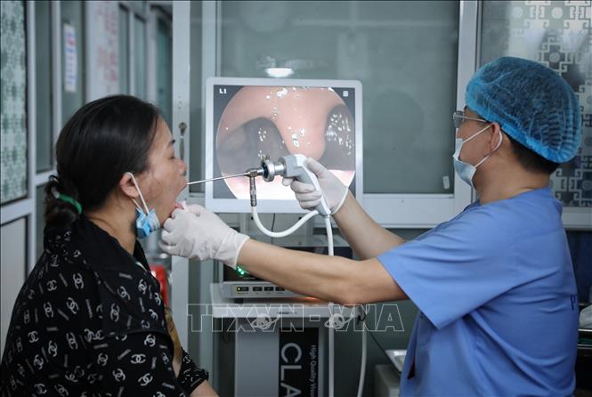Trong ảnh: Khám chữa bệnh tại Chuyên Khoa Tai mũi họng, Bệnh viện Đa khoa Sông Thương (Bắc Giang). Ảnh: Danh Lam-TTXVN
