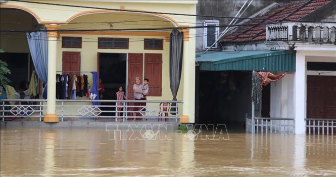 Nước lũ dâng cao tại thôn Kênh Gà, xã Gia Thịnh, huyện Gia Viễn. Ảnh: Đức Phương - TTXVN